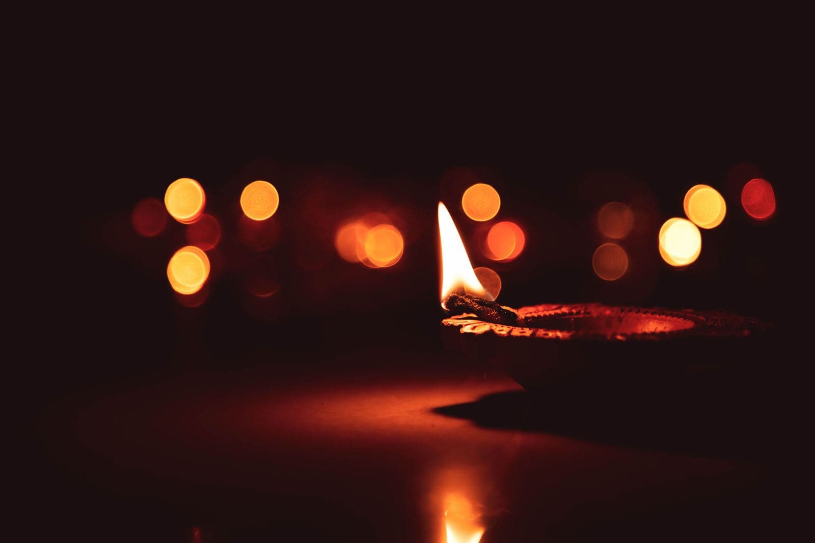 A small clay lamp lit for the river